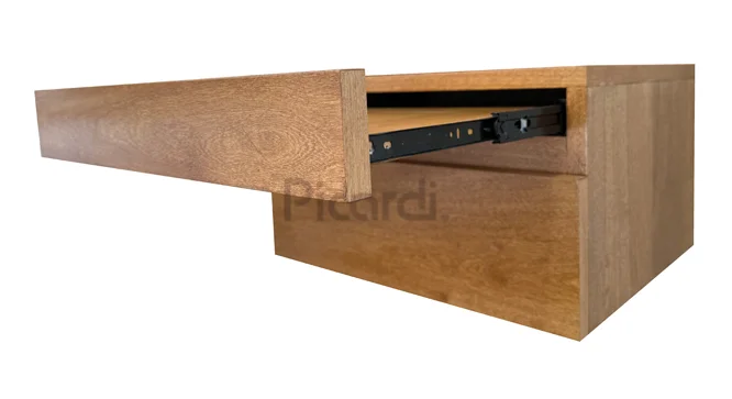 detalle de bandeja deslizante abierta con corredera telescópica en mesa de luz flotante